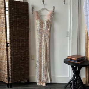 Stunning, light, pink feathered, and sequined gown - altered to size 2.
